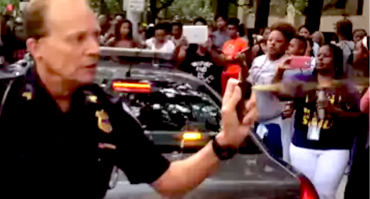 Cleveland Cop Uses Pepper Spray On Peaceful Protesters